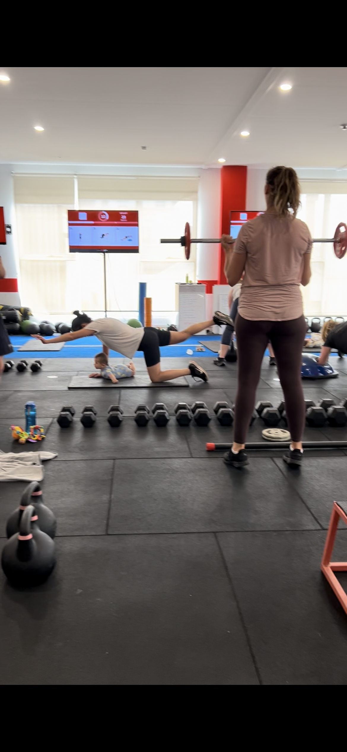 Parents exercising together with their babies at the Thrive Northcote studio