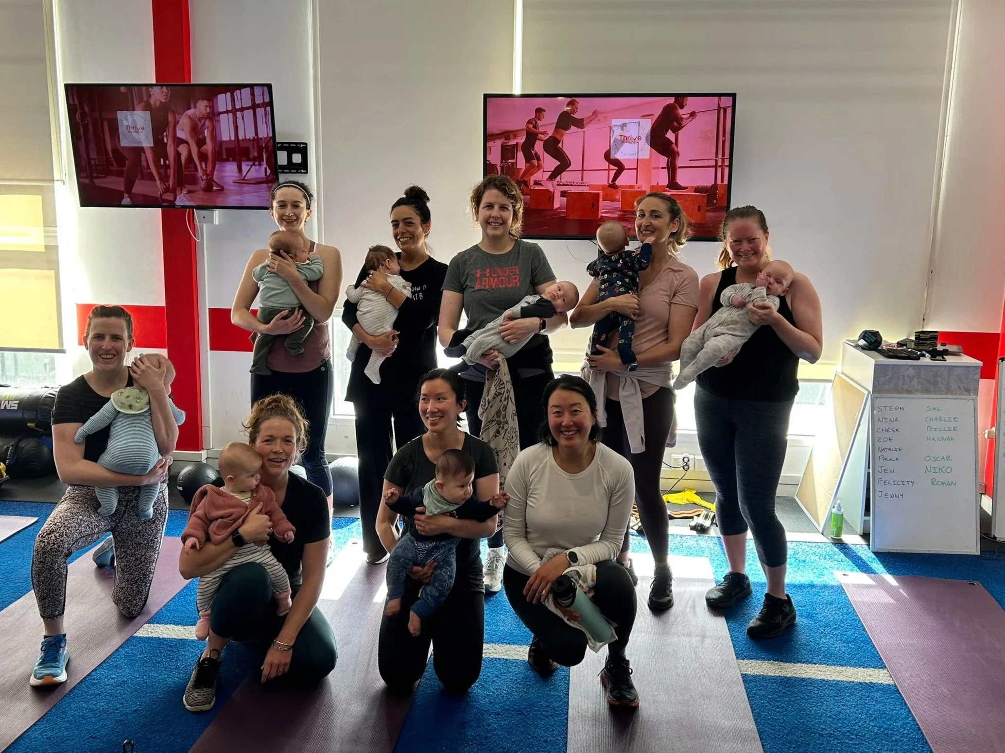Parents working out with their babies at a Mums and Bubs fitness class in Northcote, Melbourne